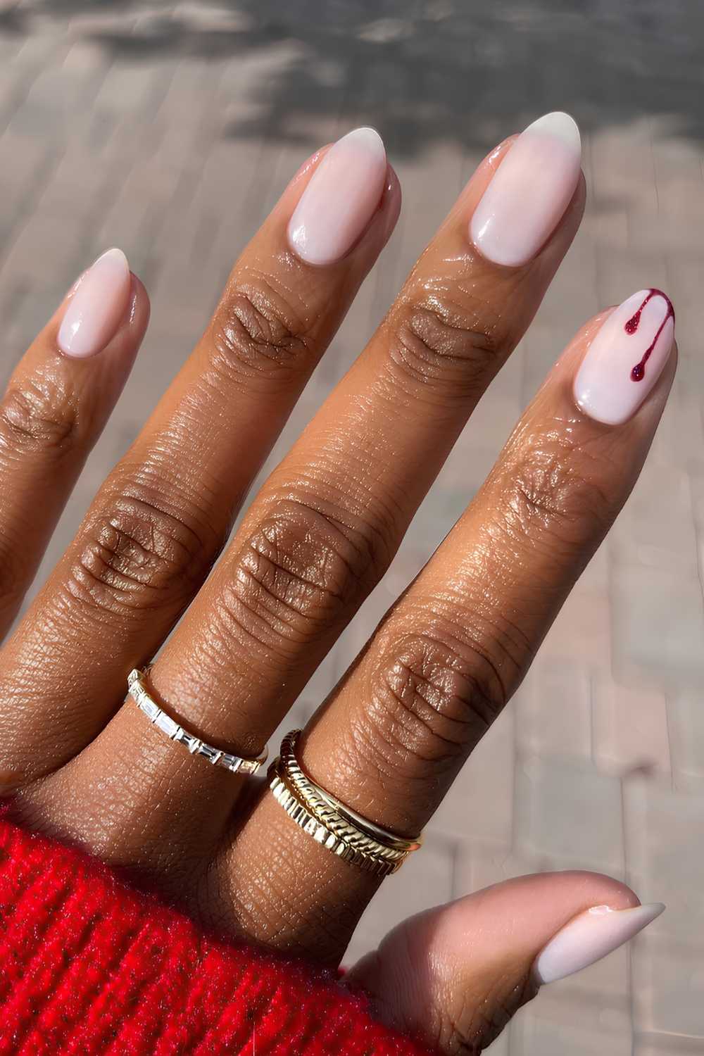 Milky nails with Halloween blood drip art