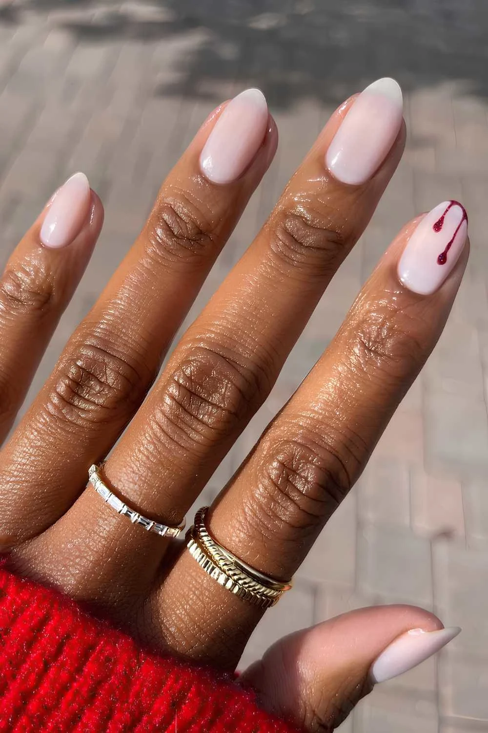 Milky nails with Halloween blood drip art