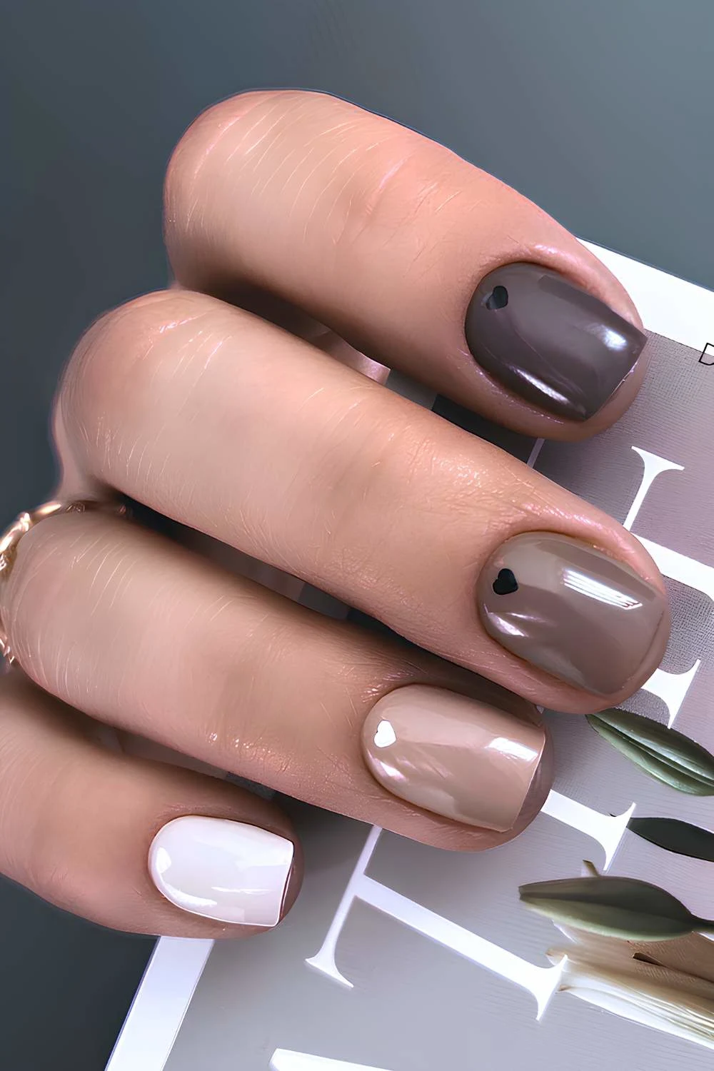 Moody skittle nails with heart accents