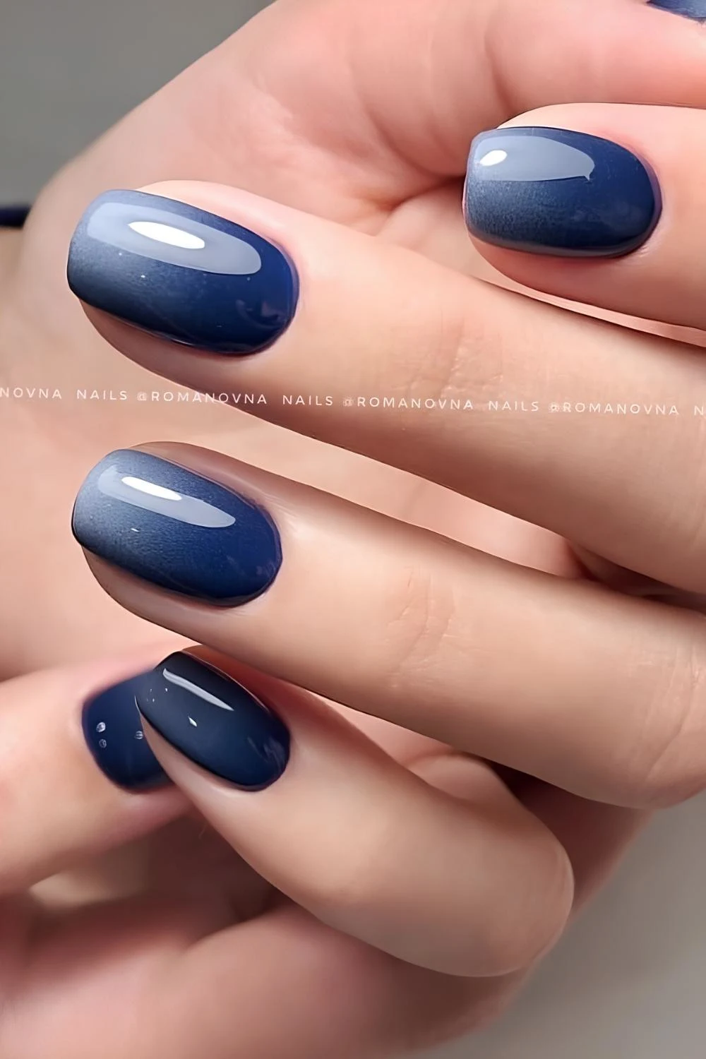 Navy blue to white ombre manicure