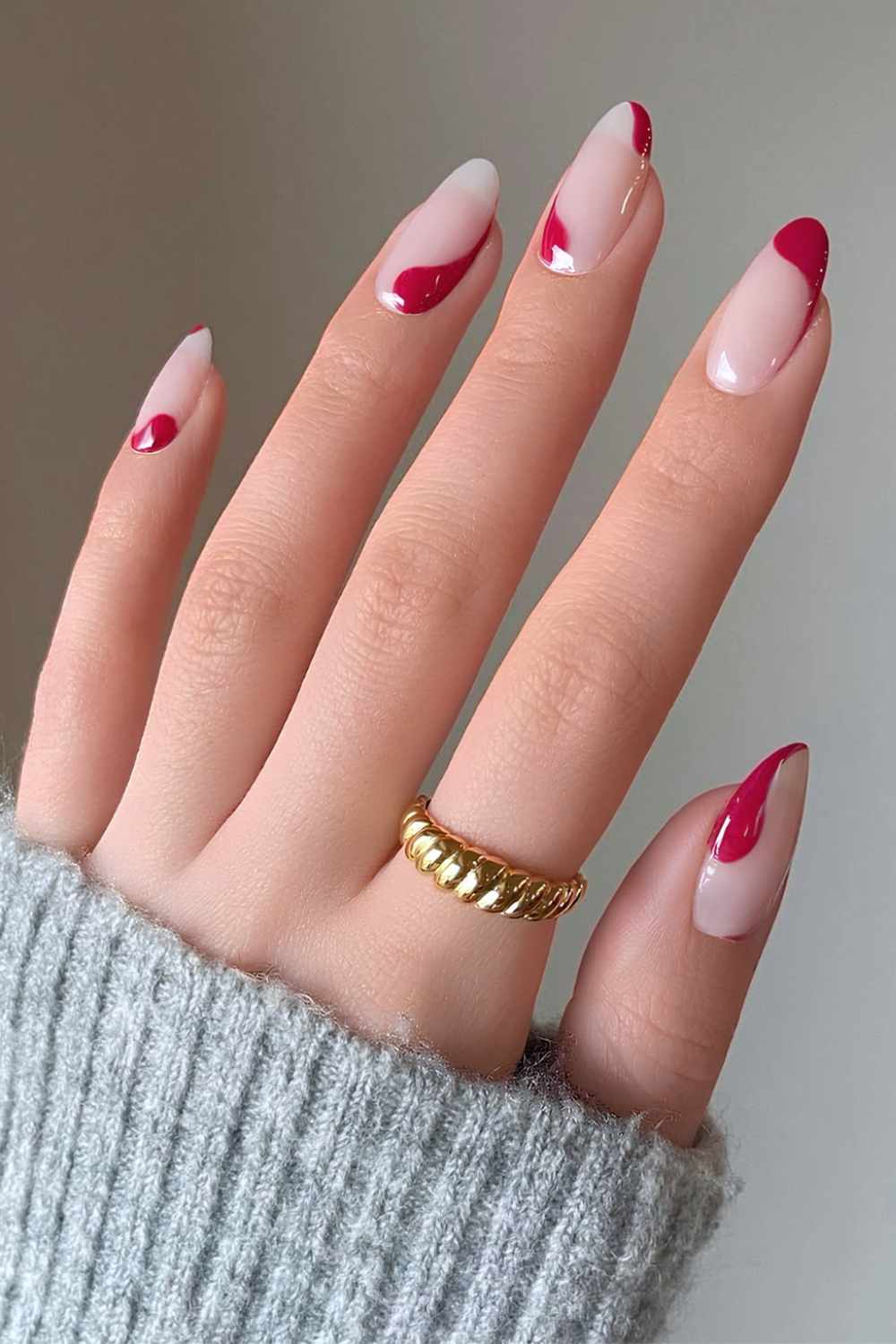 Neutral nails with abstract berry pink swirls