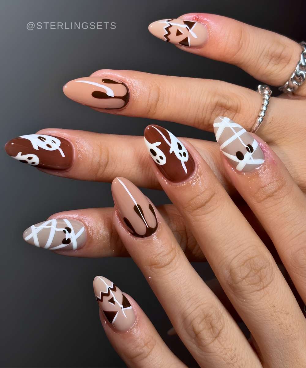 Neutral nails with spooky Halloween art