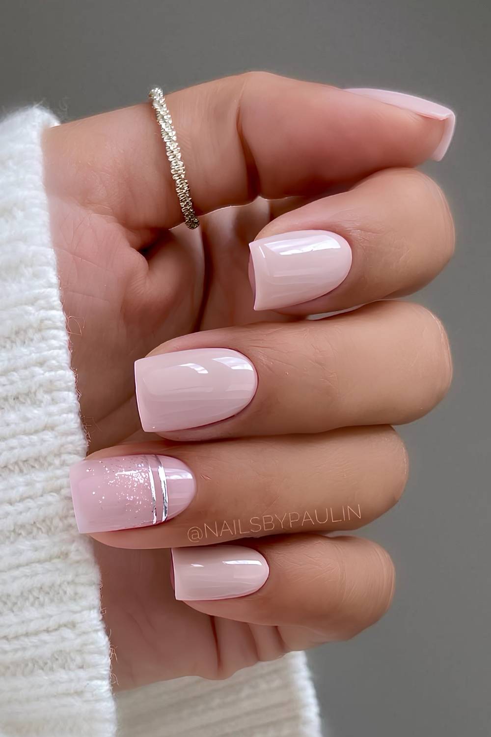 Neutral pink nails with silver accents