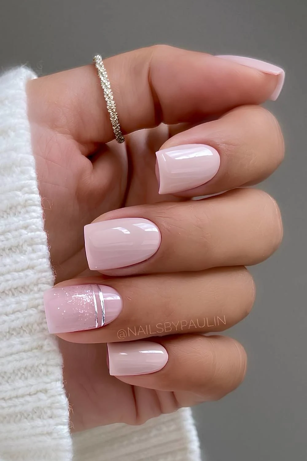 Neutral pink nails with silver accents