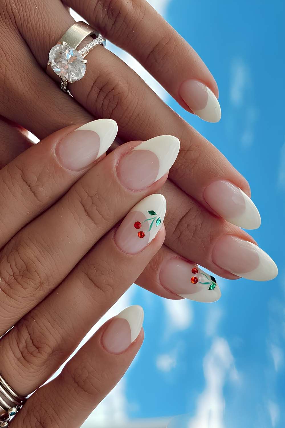 Off white thick French mani with cherry art
