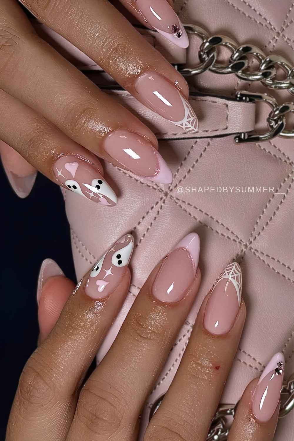 Pink French nails with spooky cute Halloween art