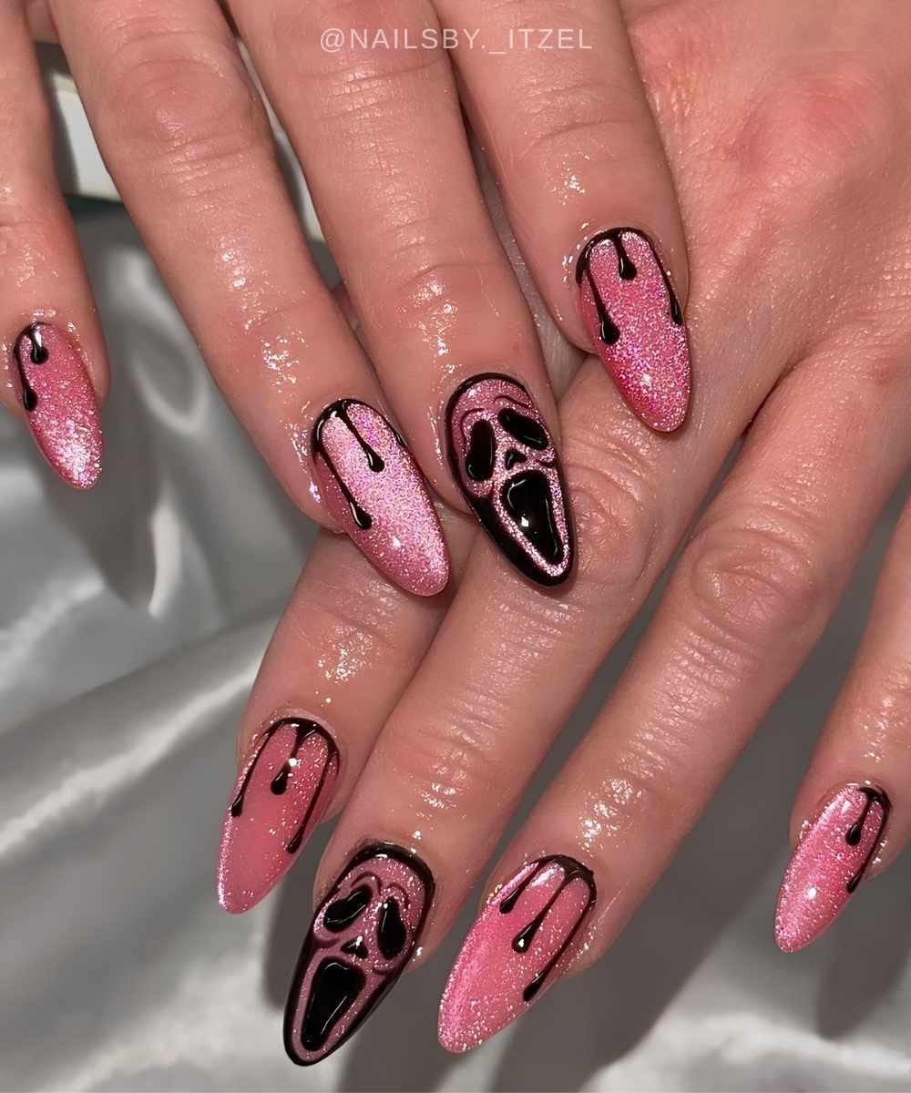 Pink velvet nails with black Halloween art