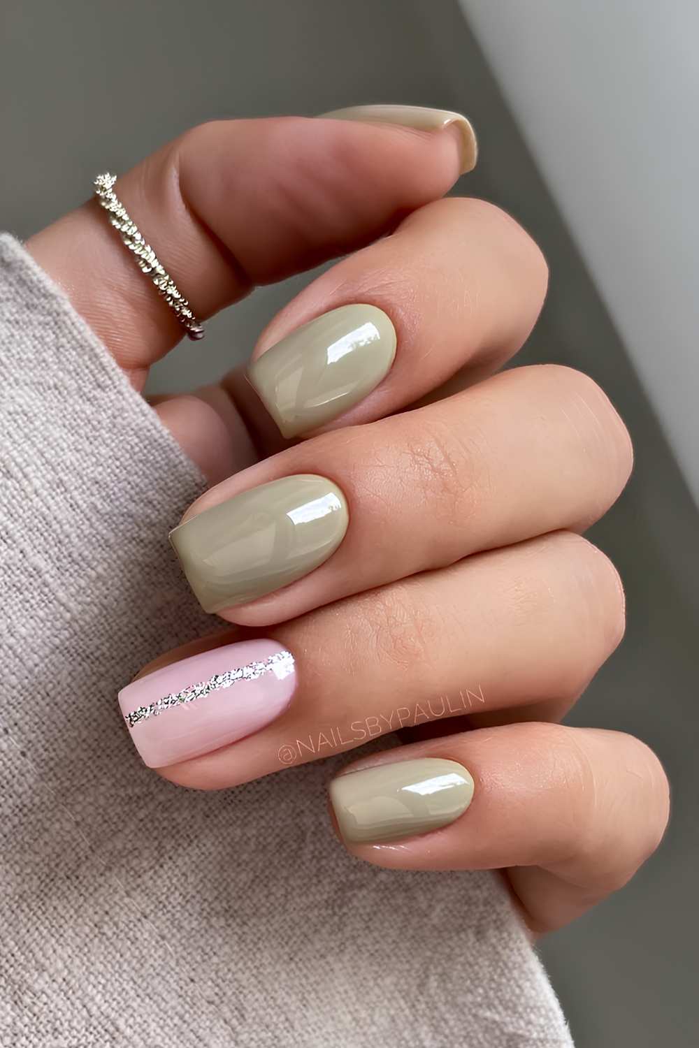 Sage green mani with silver glitter accent