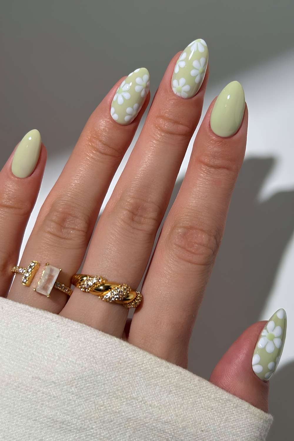 Sage green nails with white florals