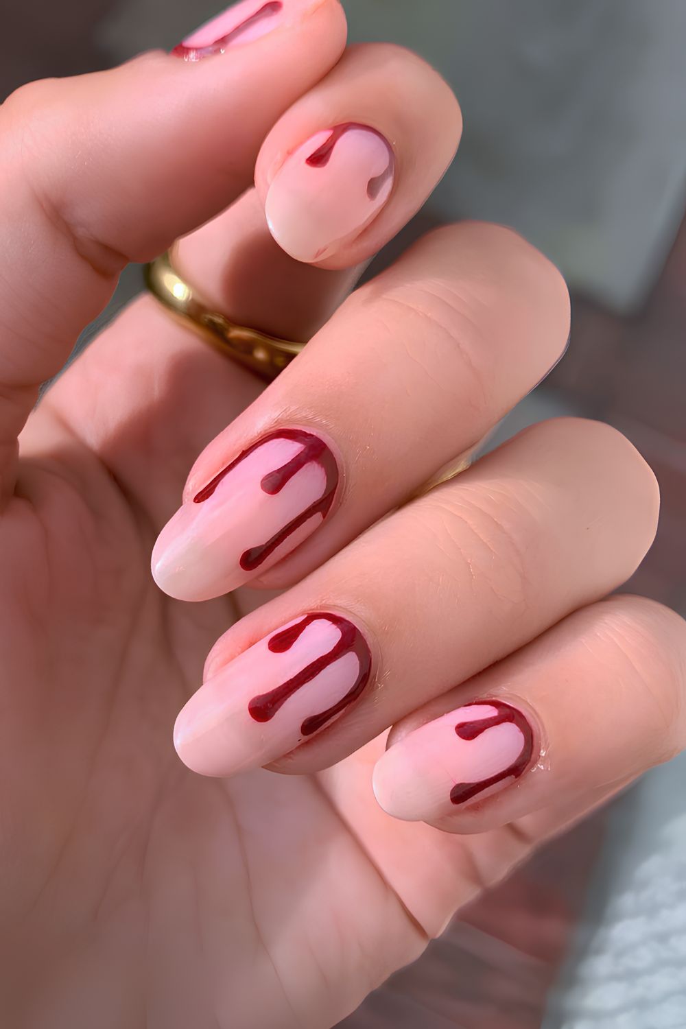 Sheer Halloween mani with blood drip art