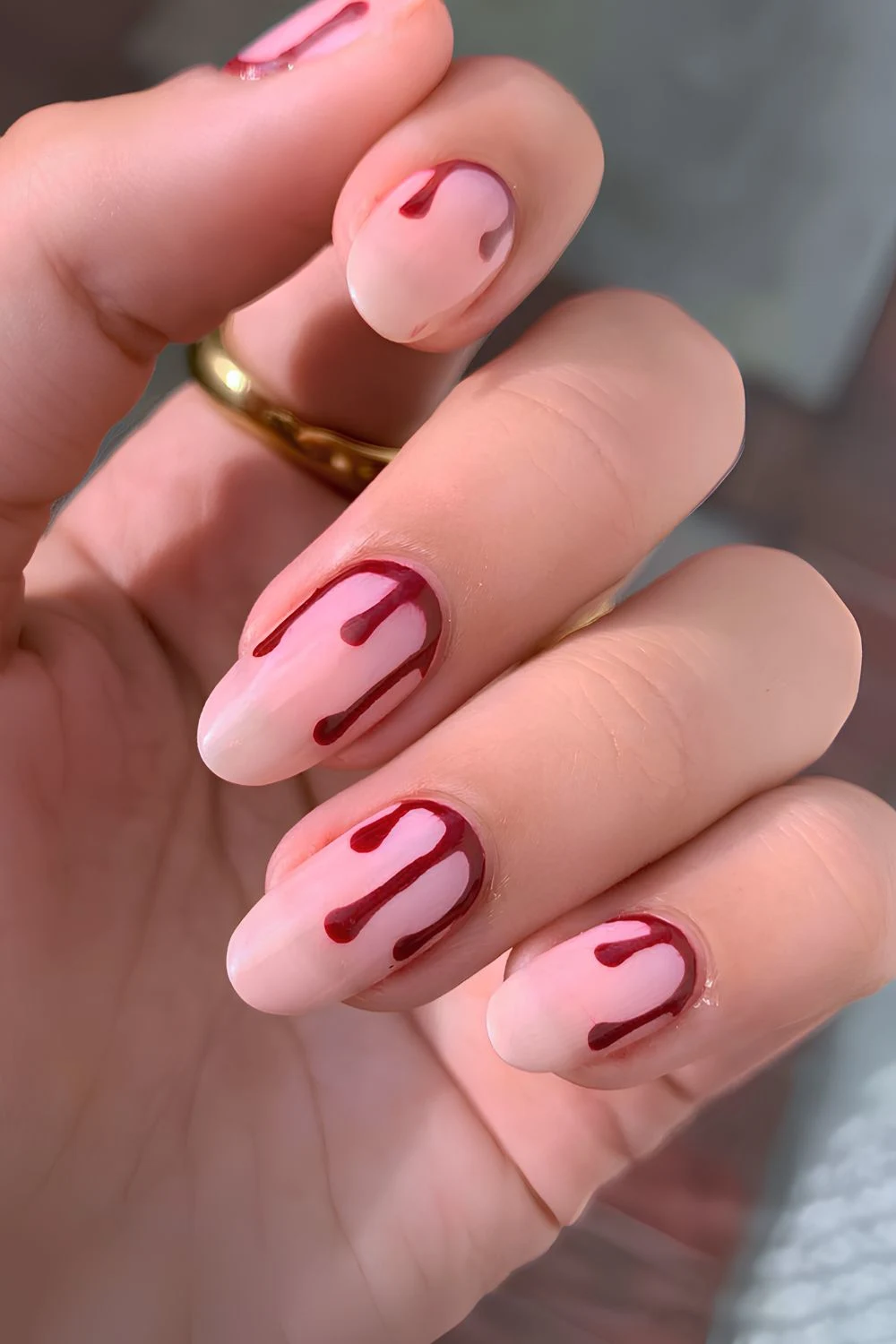 Sheer Halloween mani with blood drip art