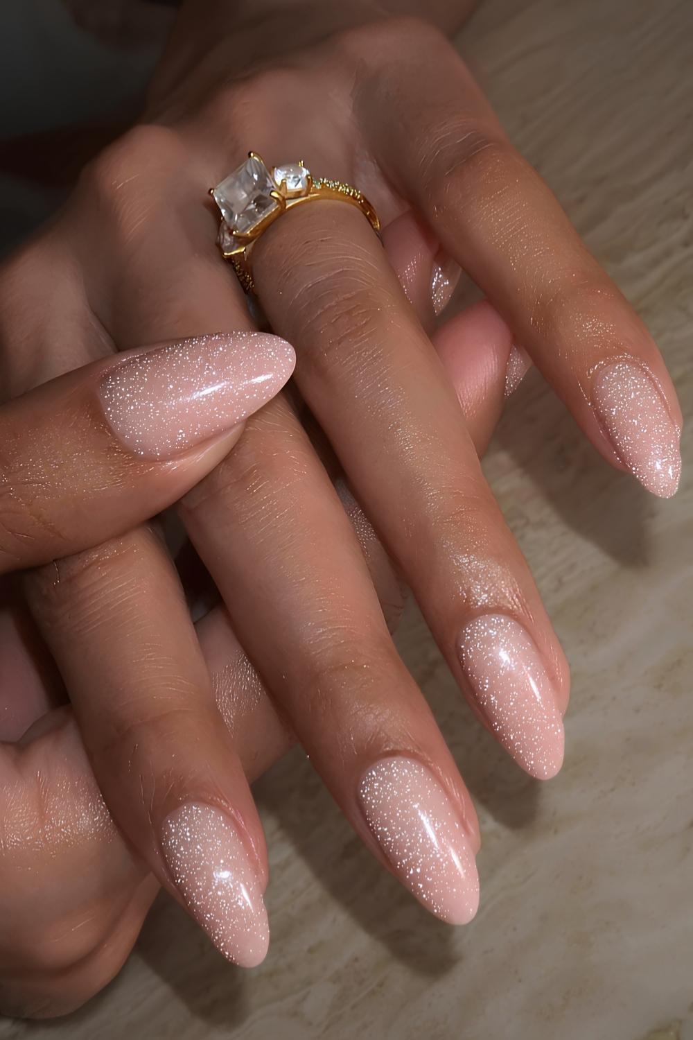 Shimmery neutral almond nails
