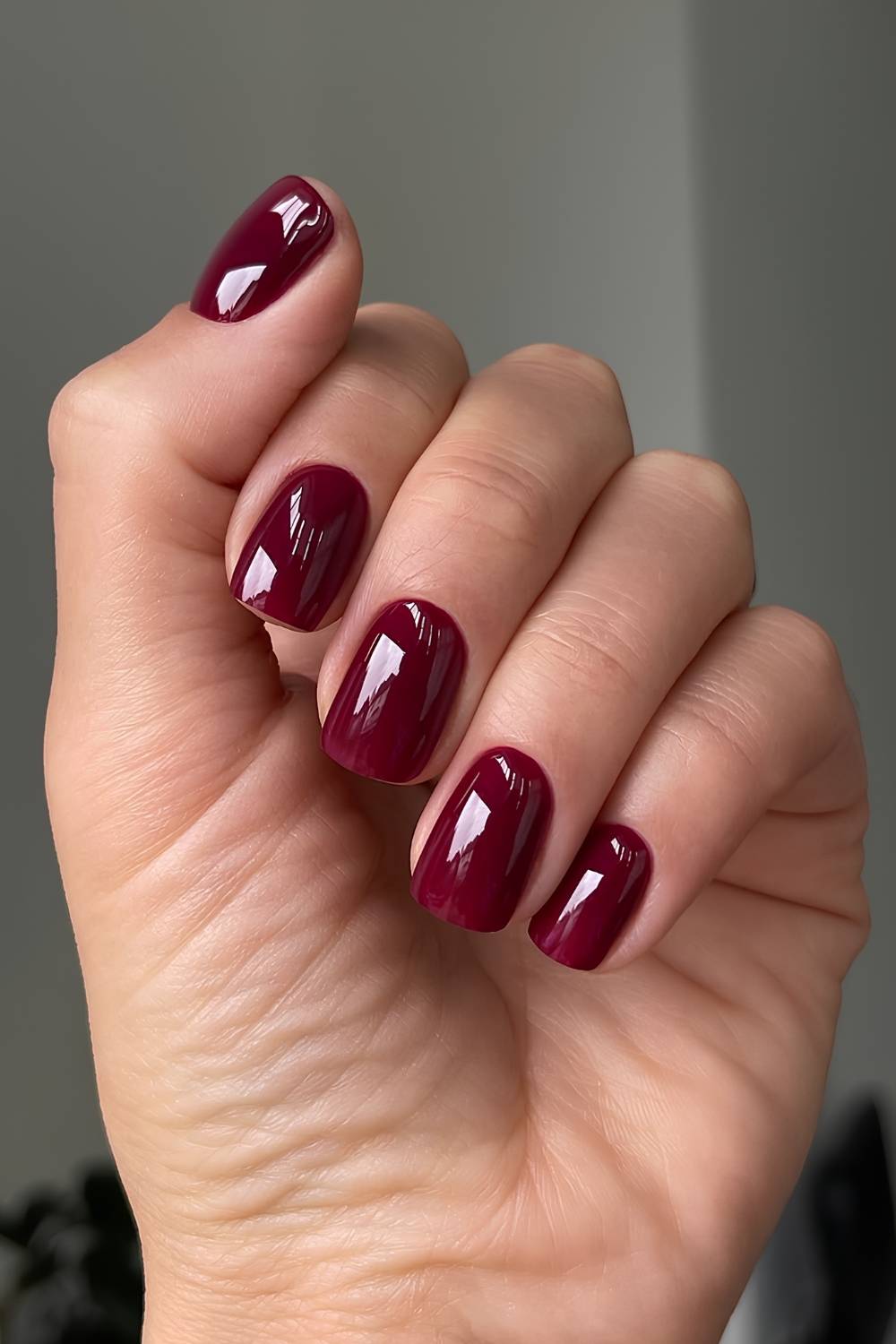 Short deep red nails