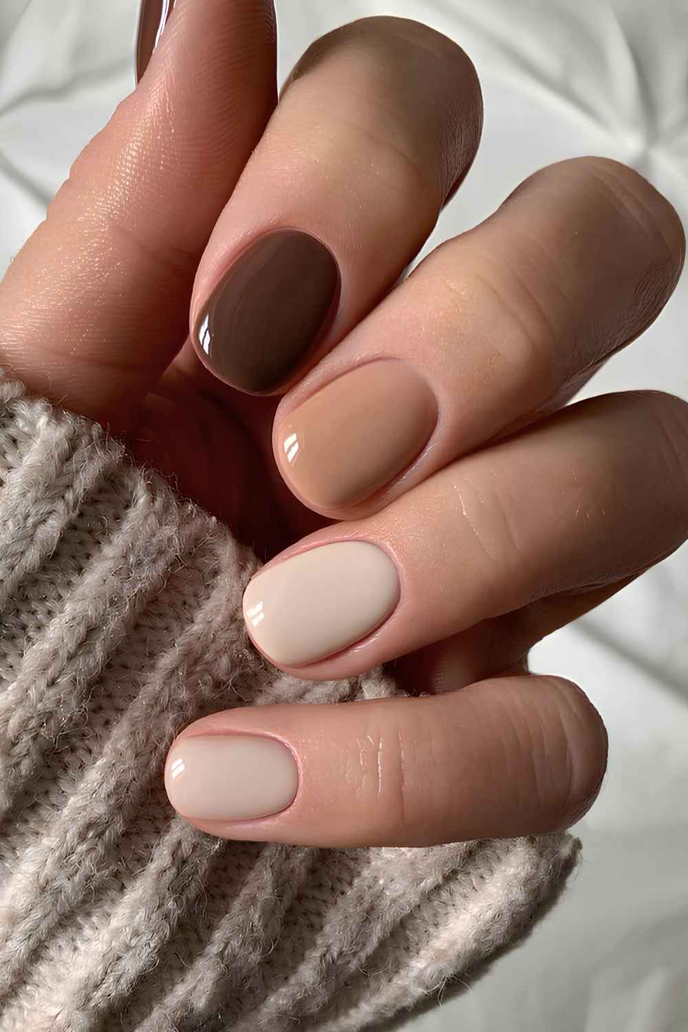 Skittle manicure in neutral tones