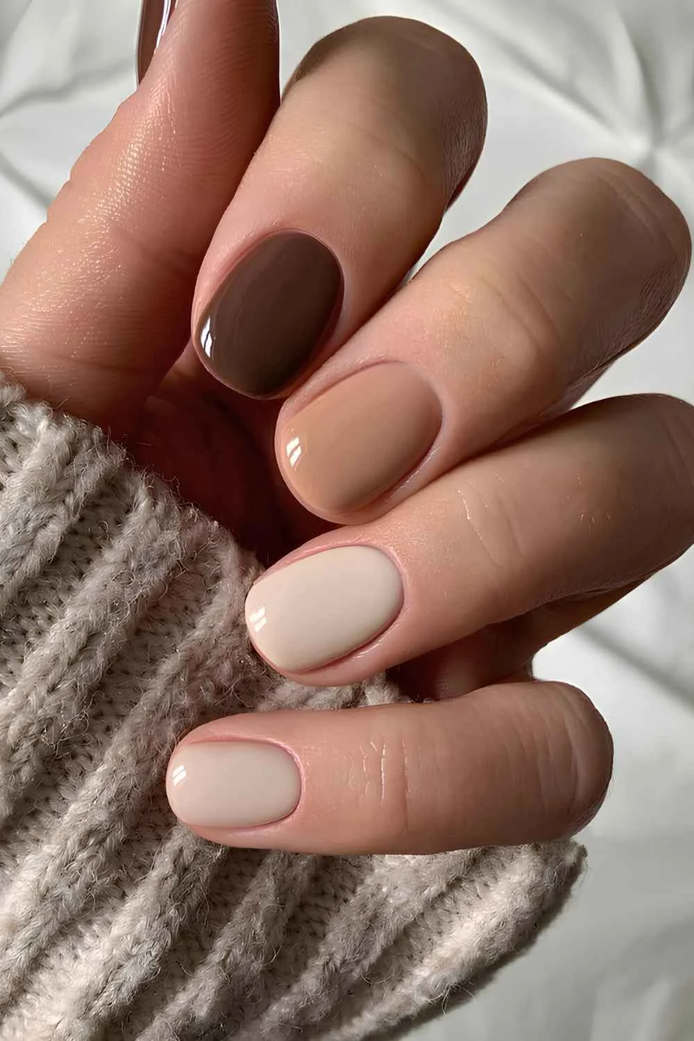 Skittle manicure in neutral tones