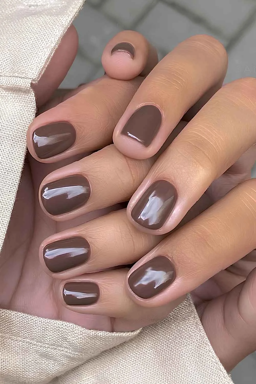 Squoval glossy brown nails
