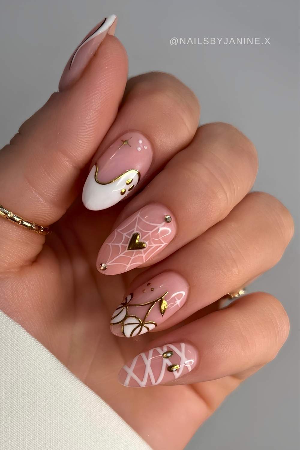 White Halloween mix and match nails