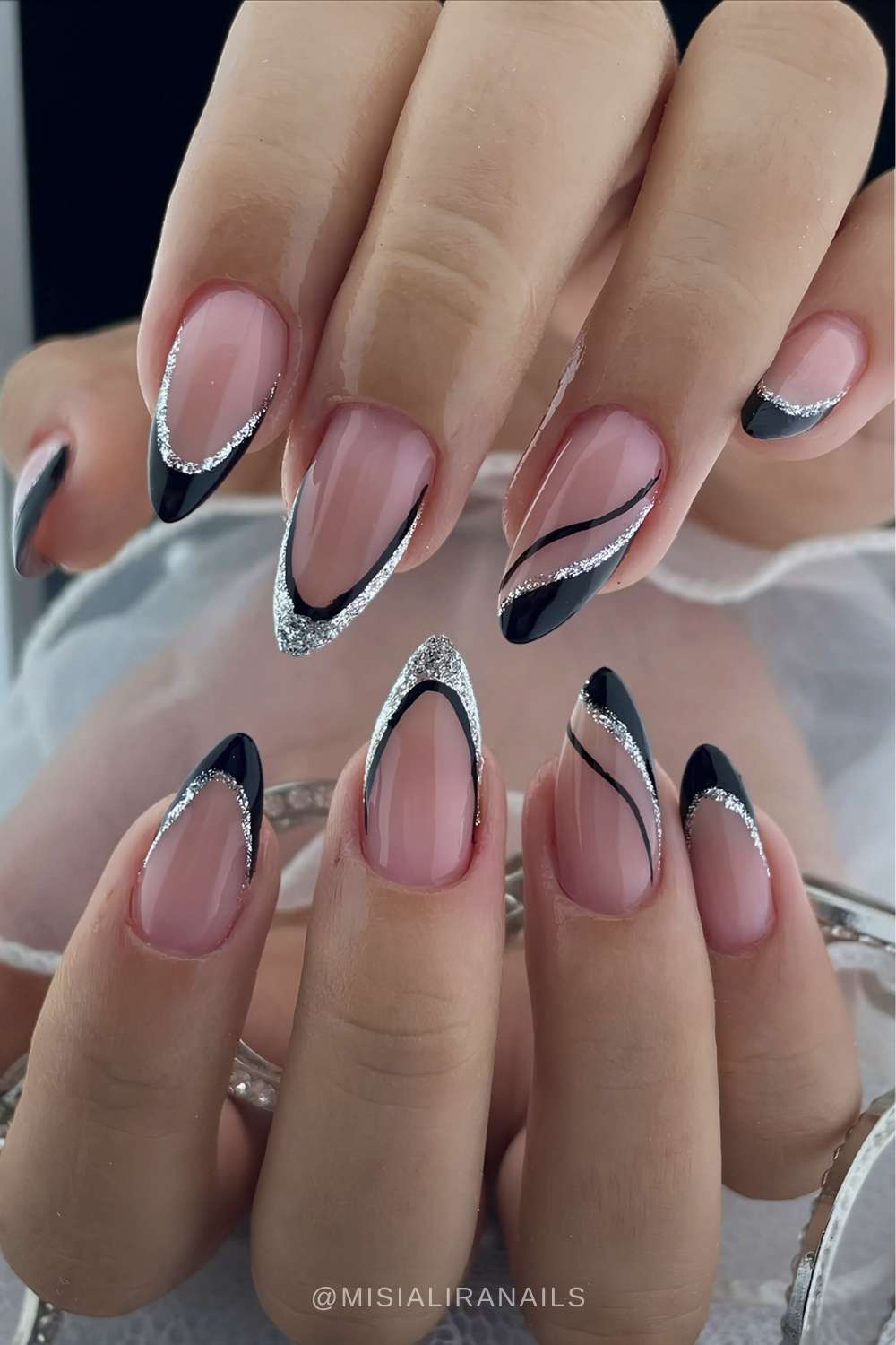 Black and silver glitter French tip manicure