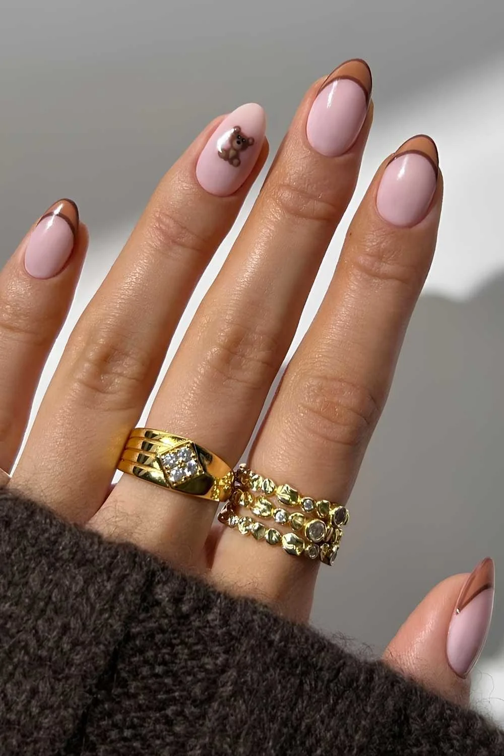 Brown French nails with teddy bear art