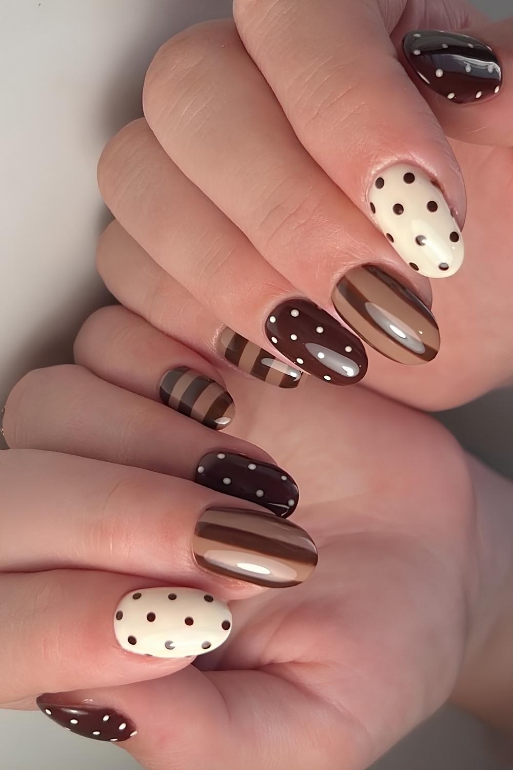 Brown and white nails with stripes and polka dots