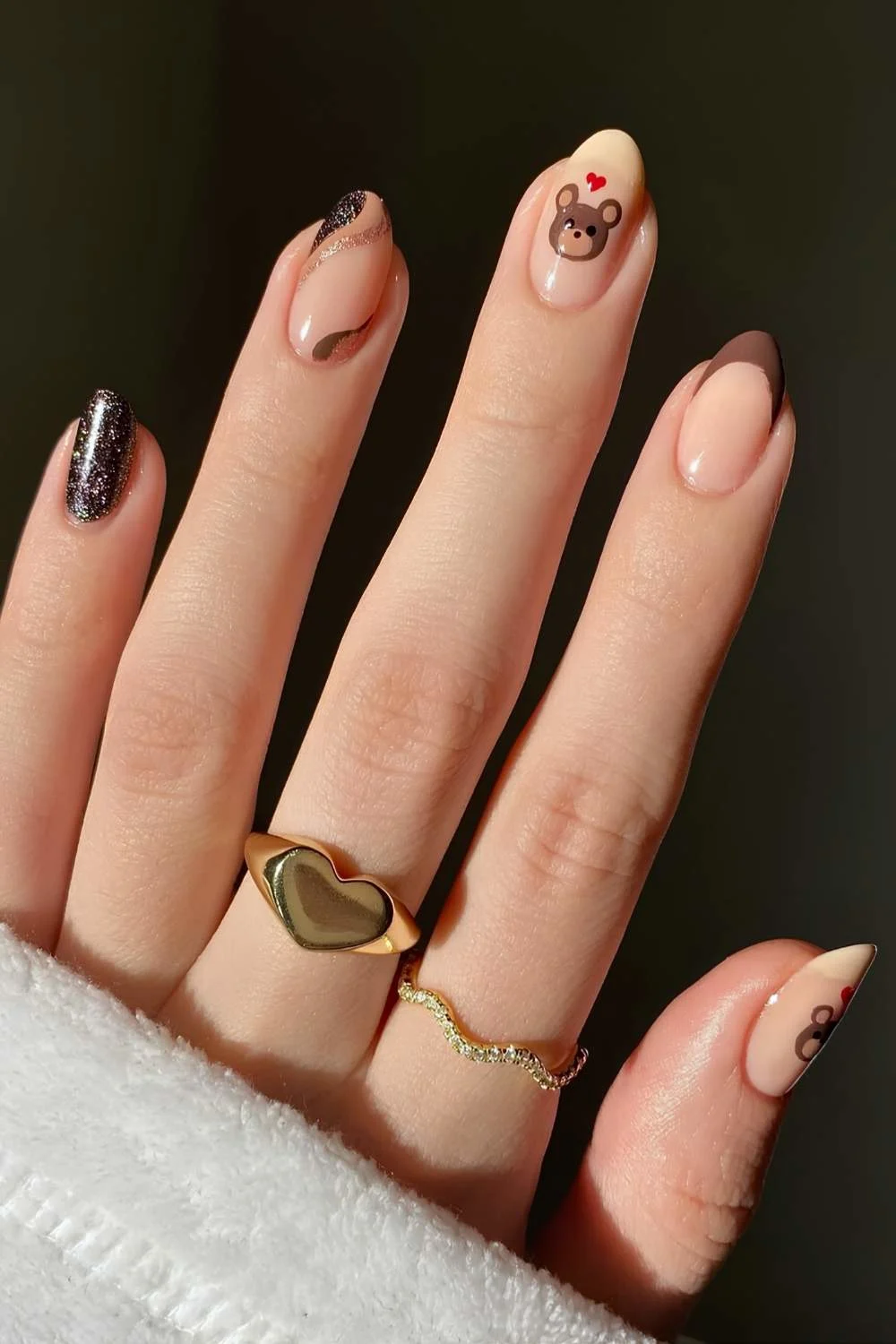 Brown nails with glitter and teddy bear art