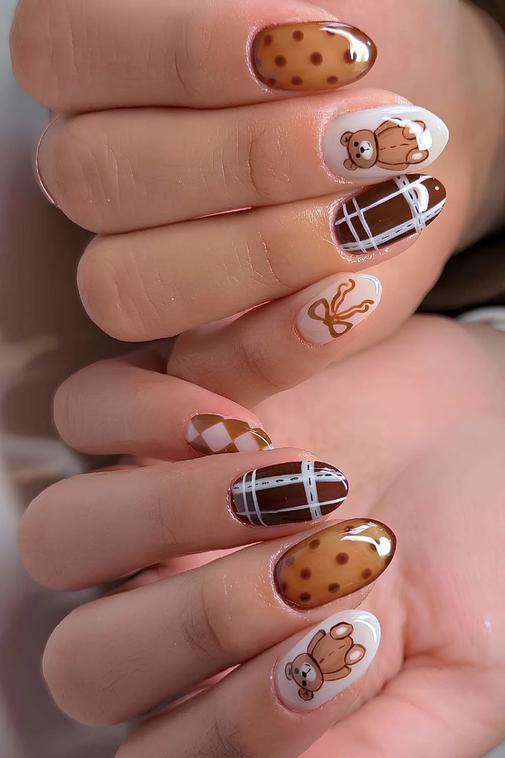 Brown nails with teddy and polka dot art