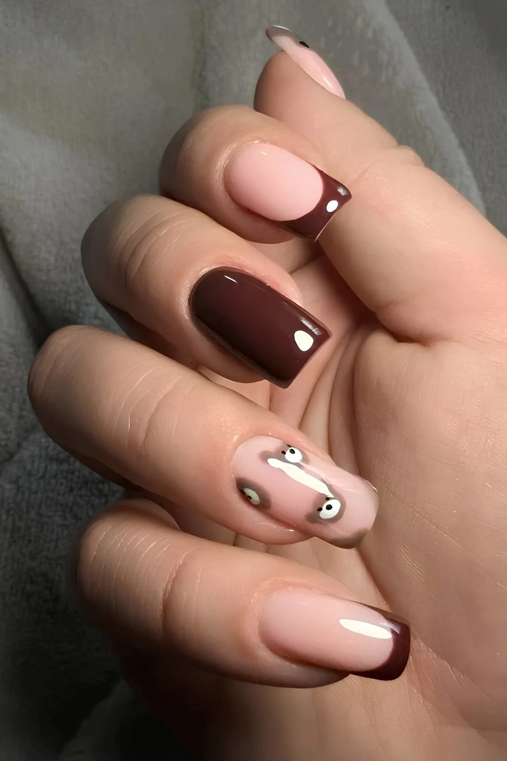 Chocolate brown nails with teddy bear art