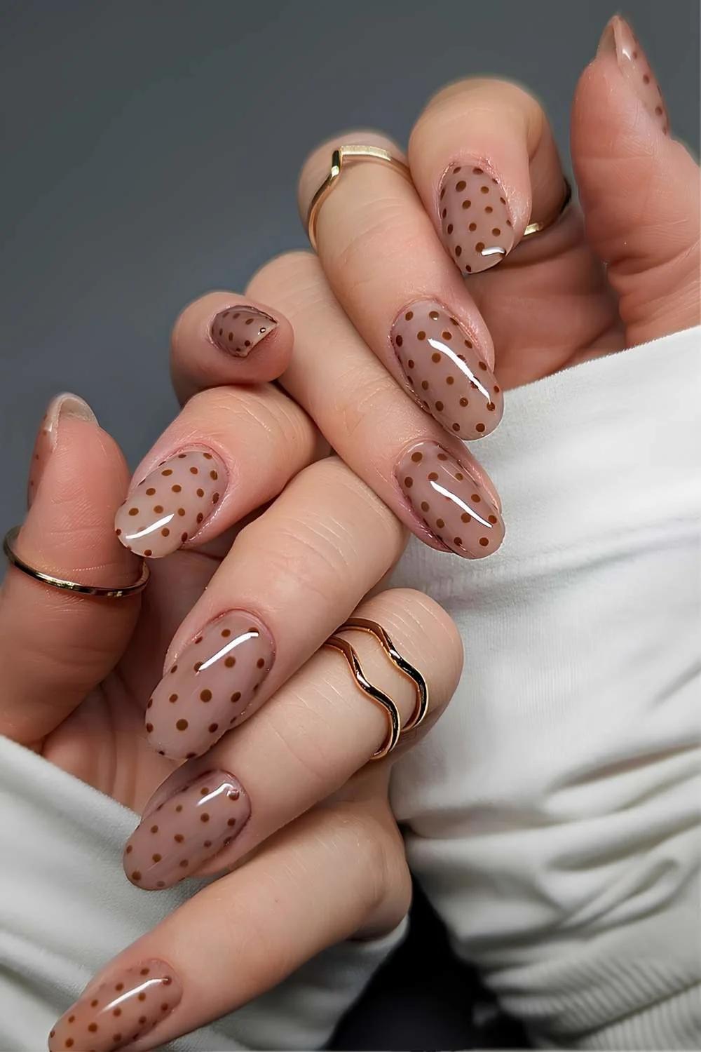 Light brown polka dot nails