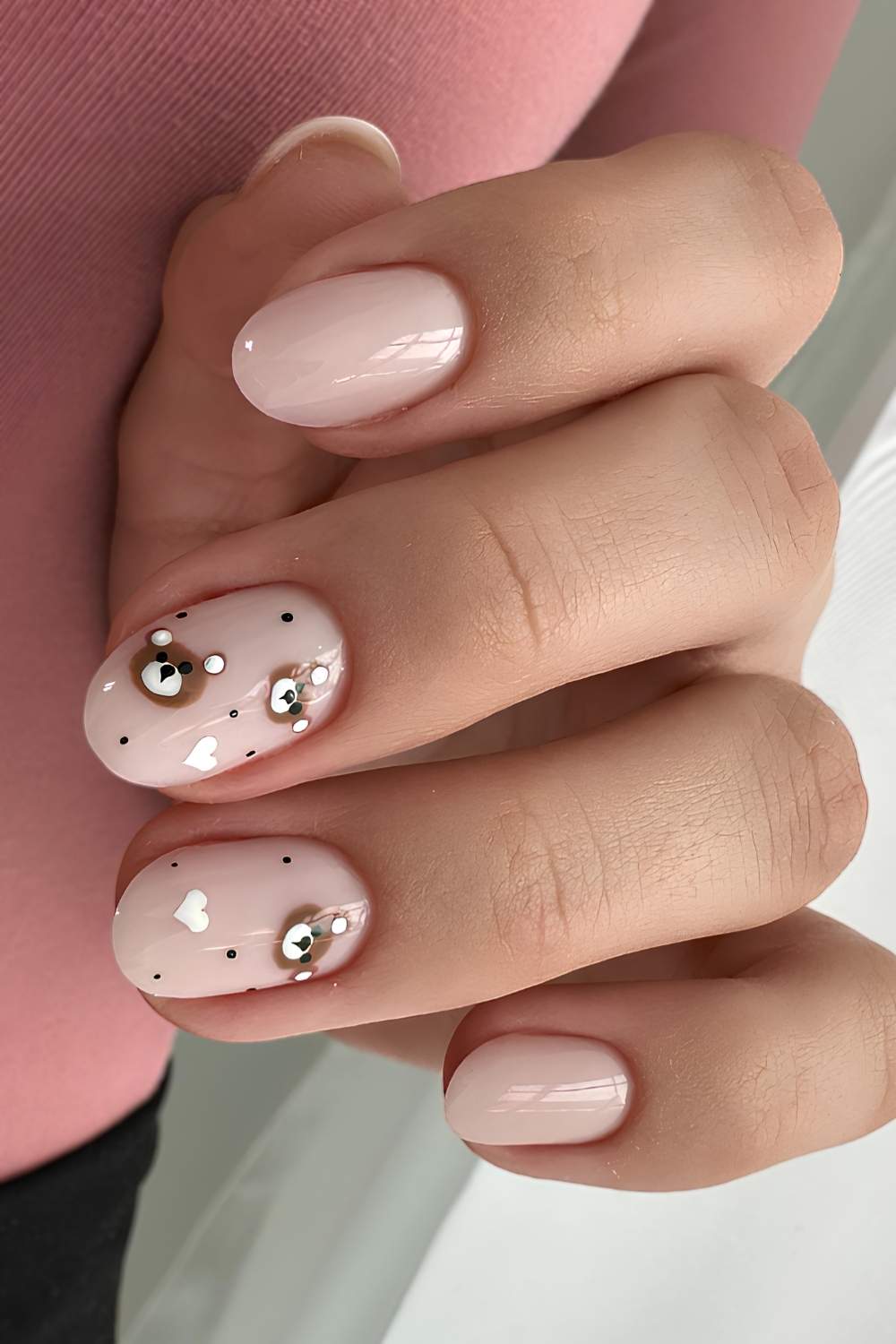 Milky white nails with teddy bear art