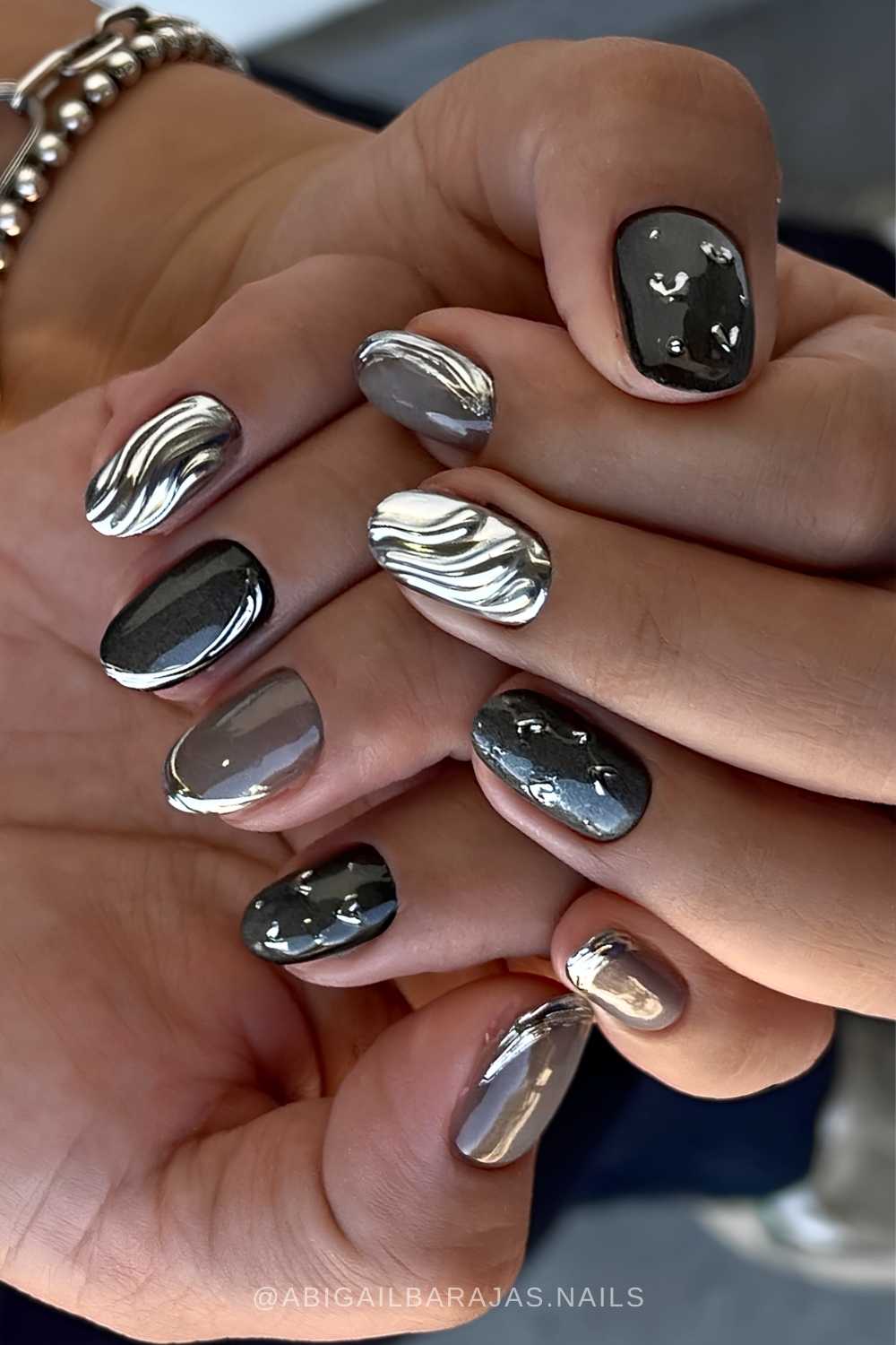 Textured abstract black and silver nails