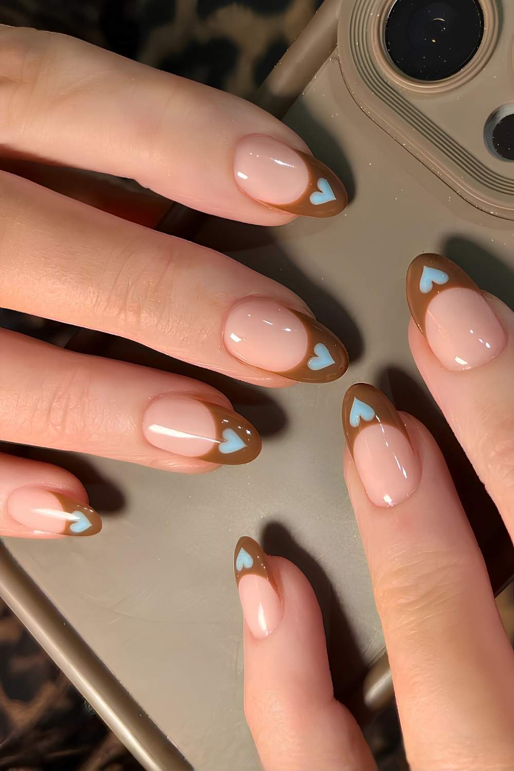 Brown French mani with blue hearts