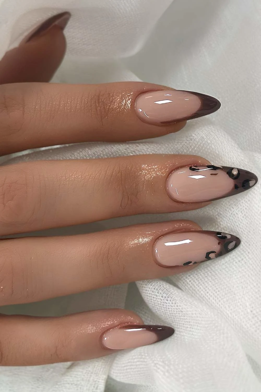 Brown French nails with leopard print