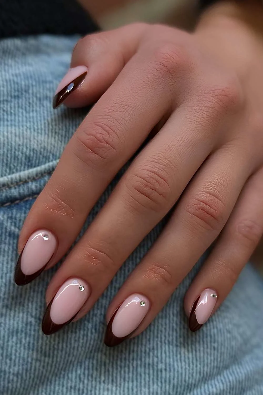 Brown French nails with rhinestones