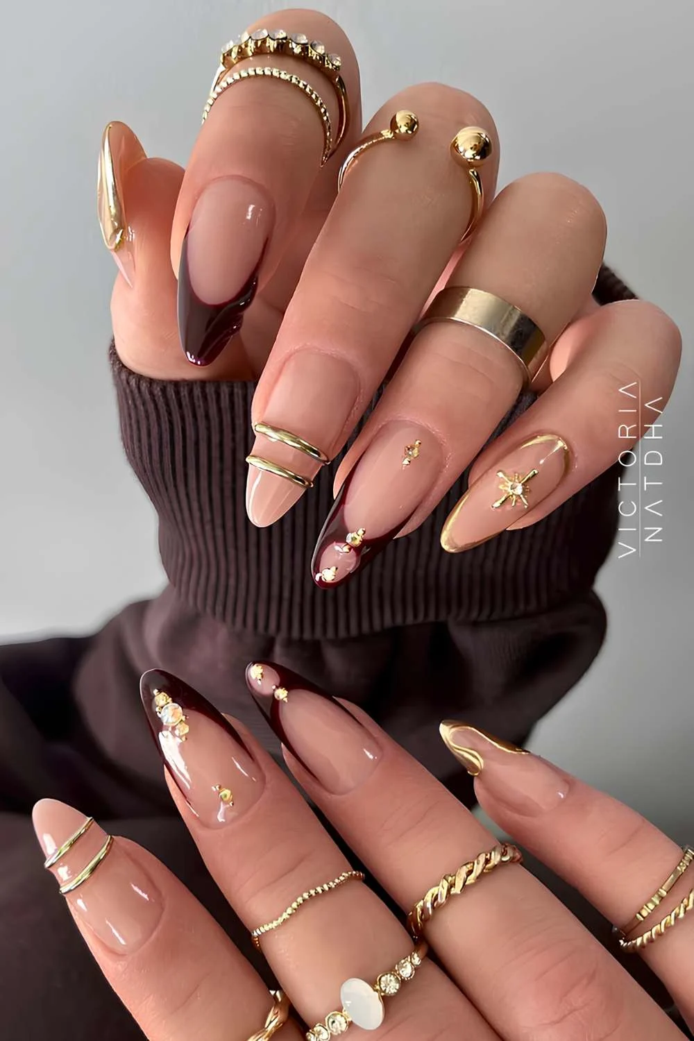 Brown nails with accent gold bangle art