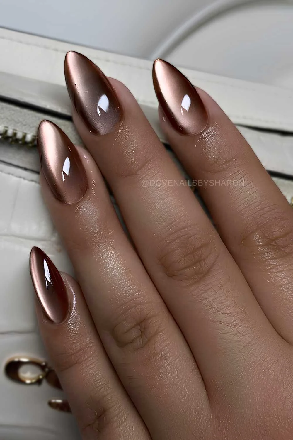 Long almond brown cat eye nails