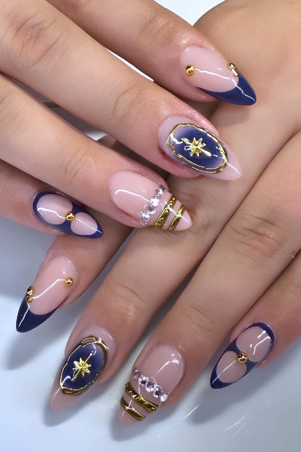 Navy blue and gold bangle nails