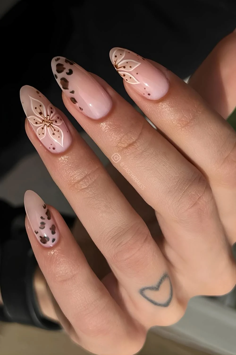 Nutral nails with floral art and leopard print
