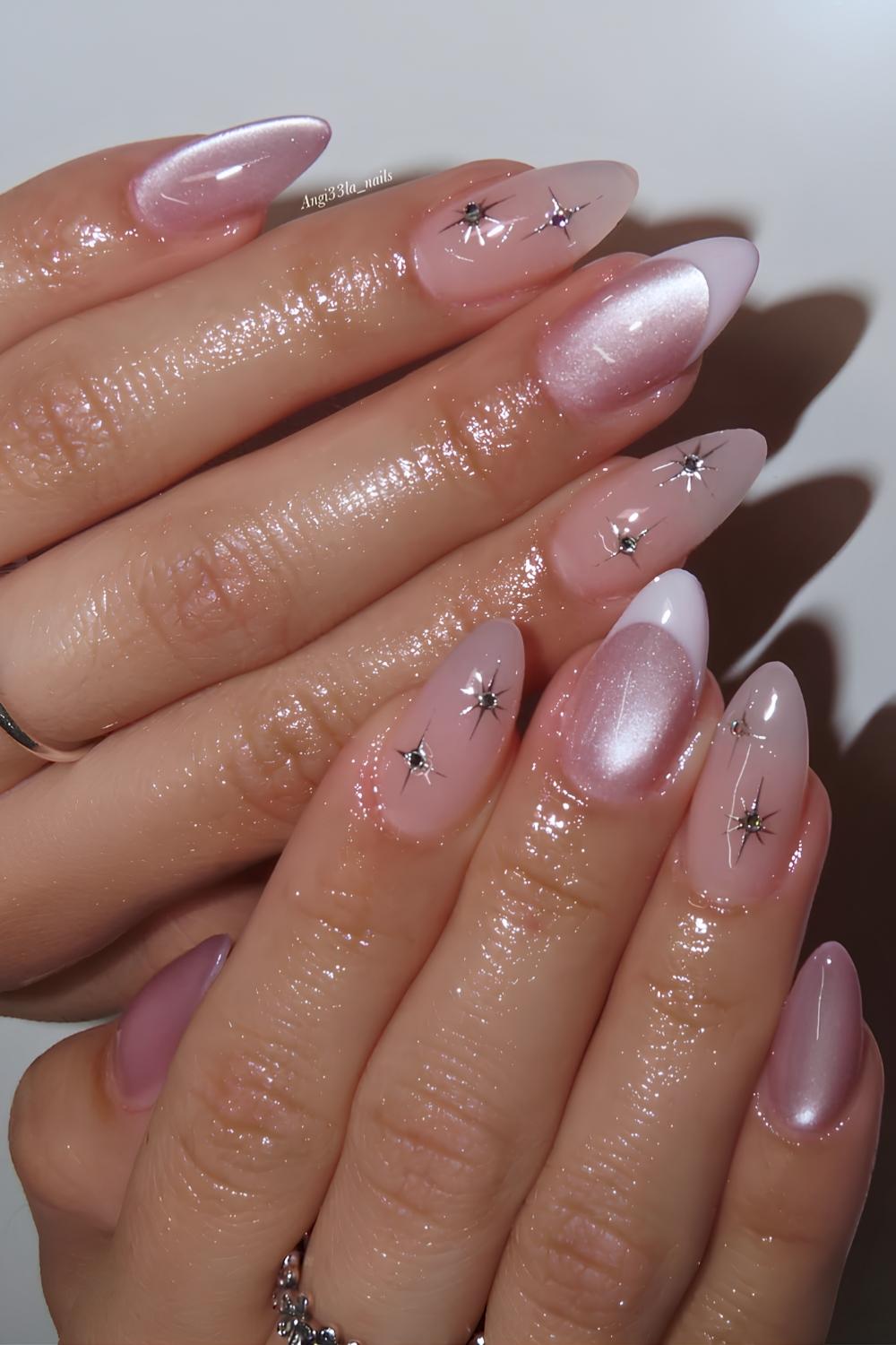Pink cat eye manicure with celestial art