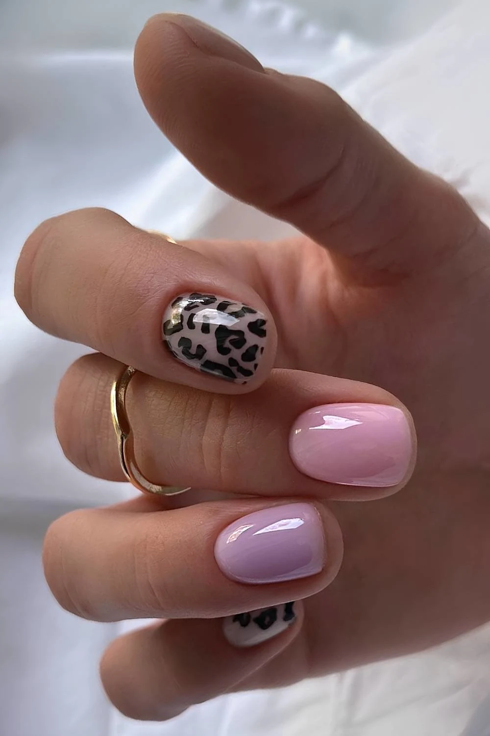 Purple and pink cheetah print nails