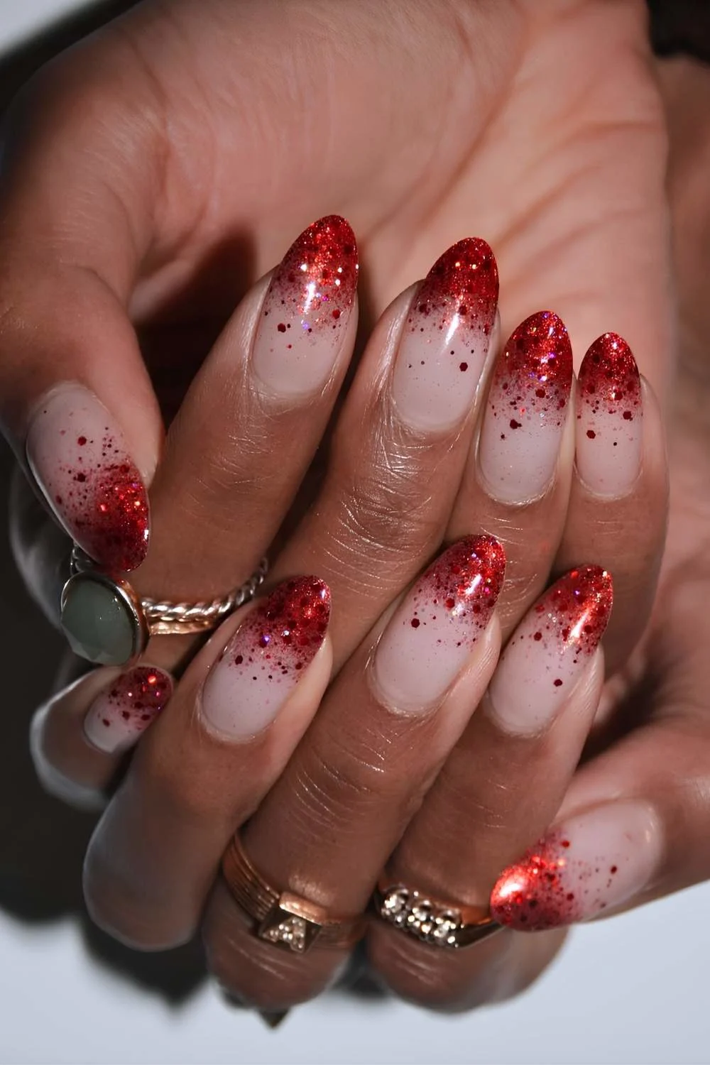 Red glitter ombre manicure