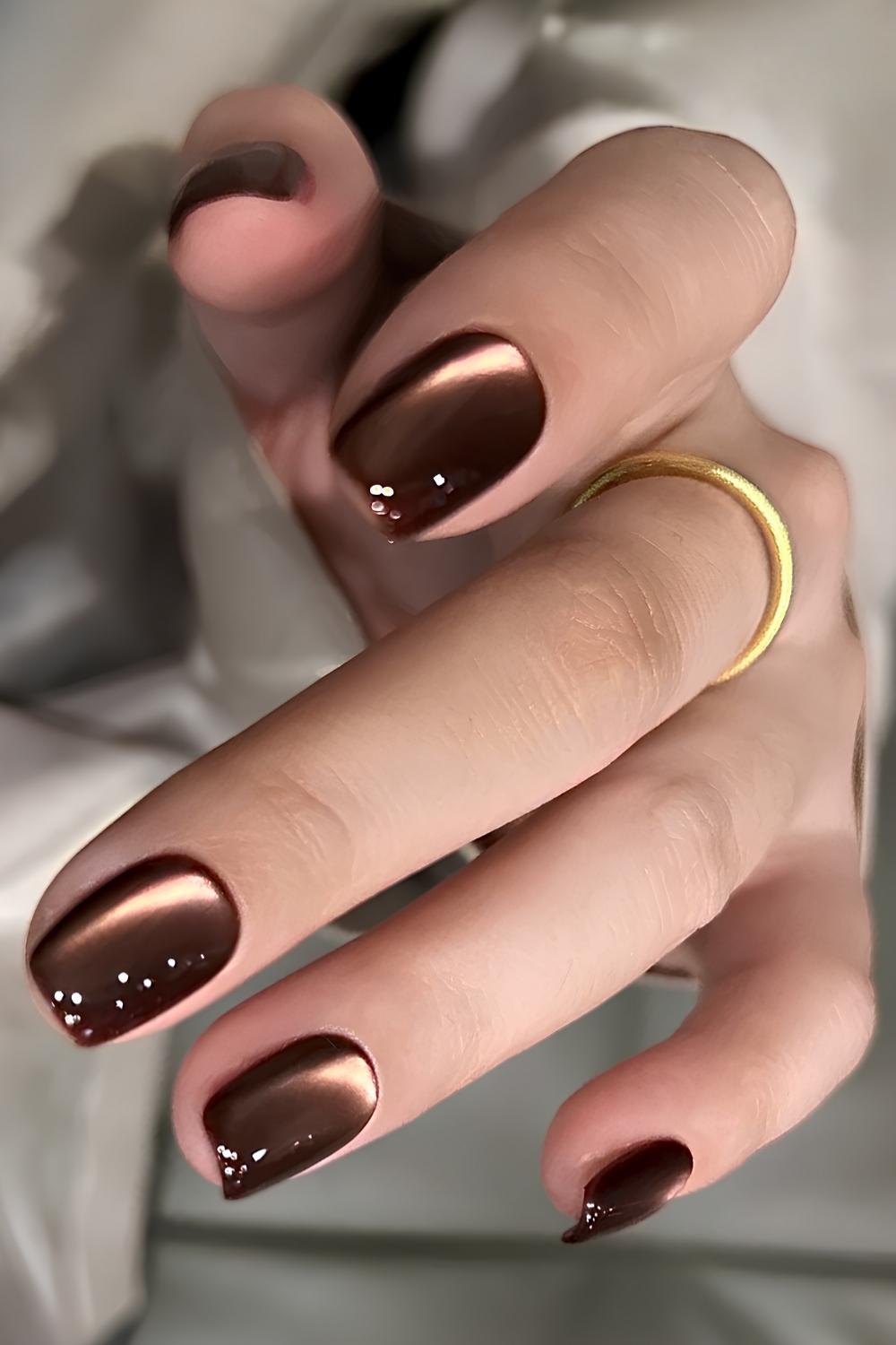 Short brown cat eye nails