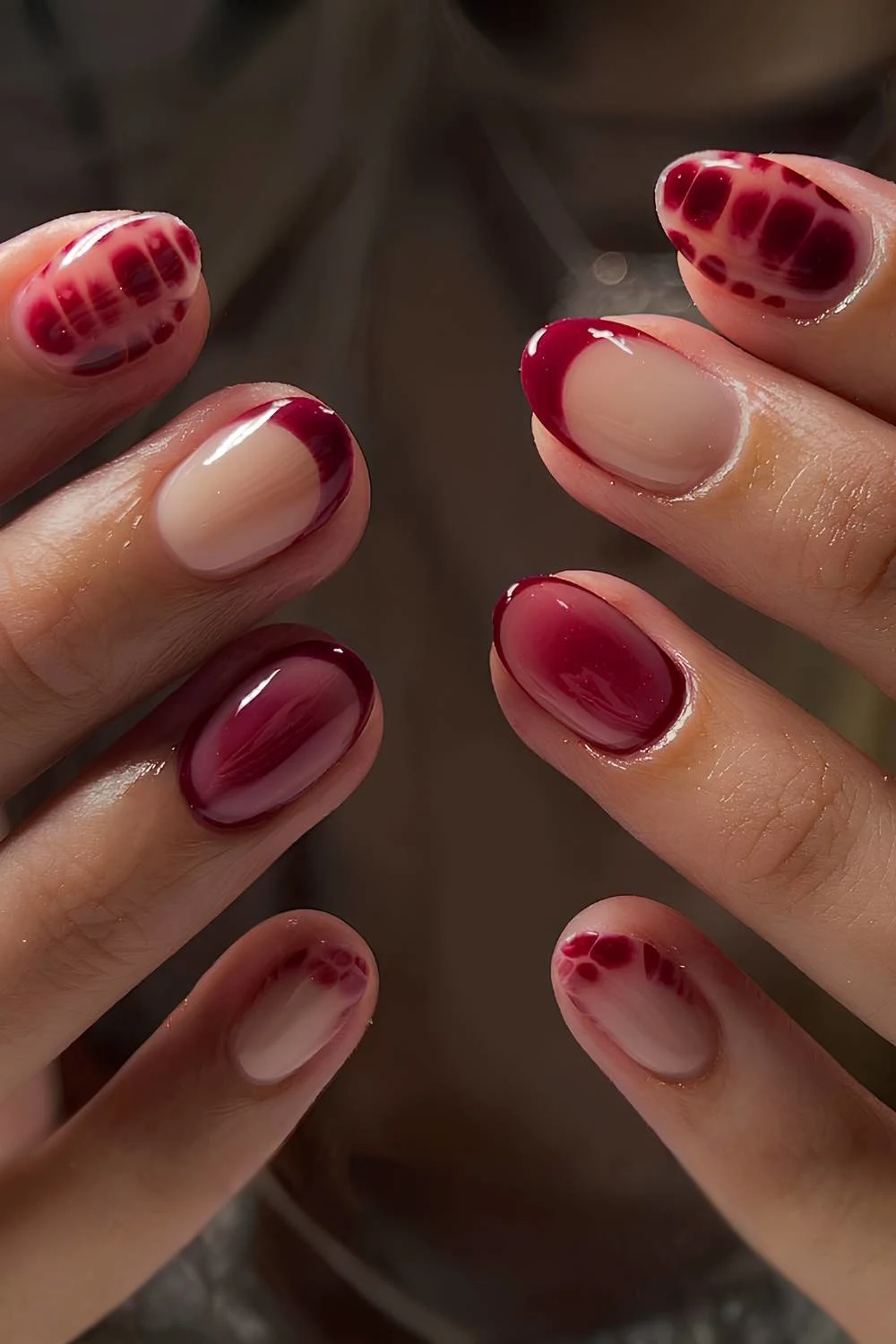 Short burgundy mix and match nails