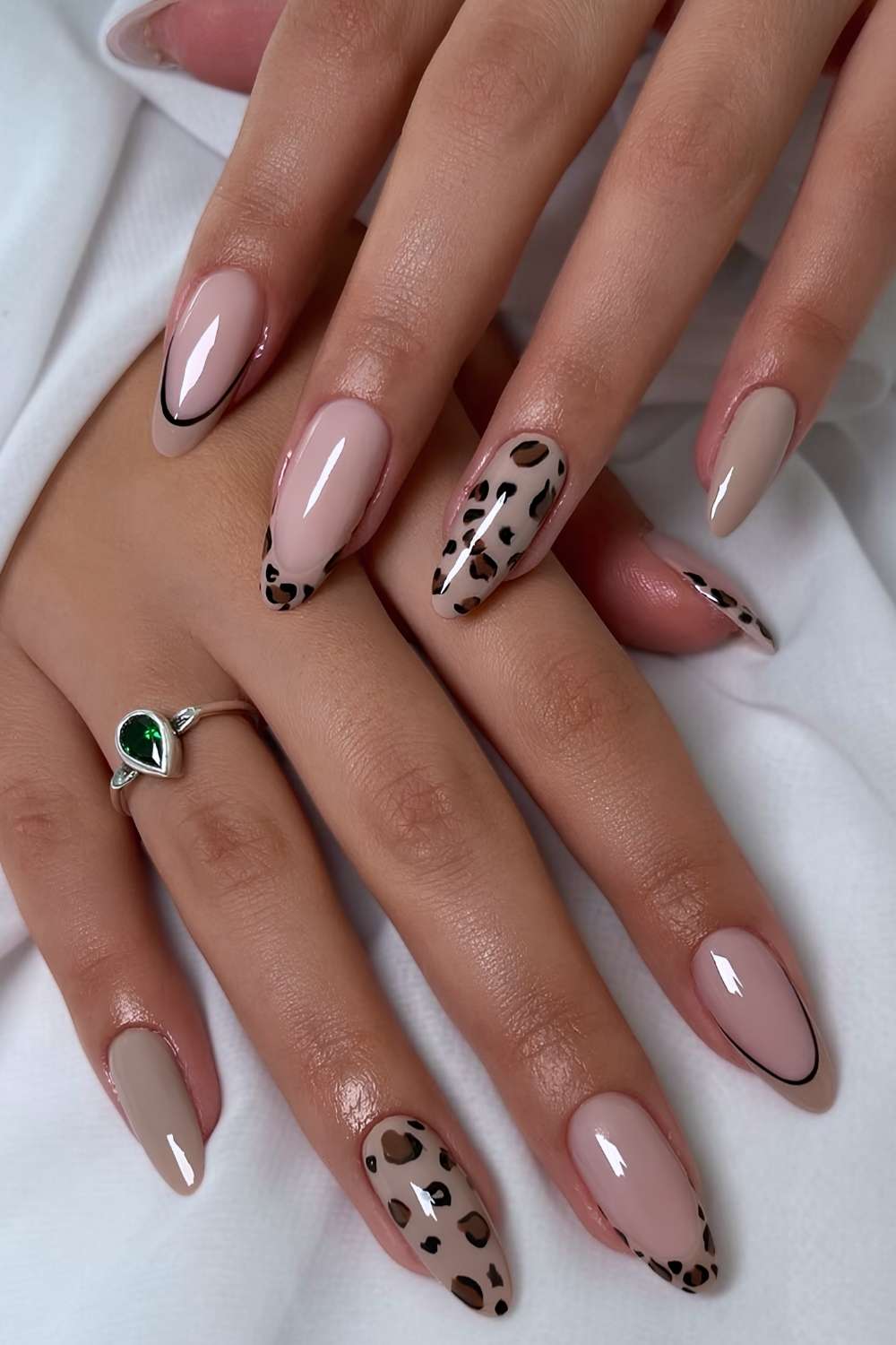 Taupe nails with leopard print art