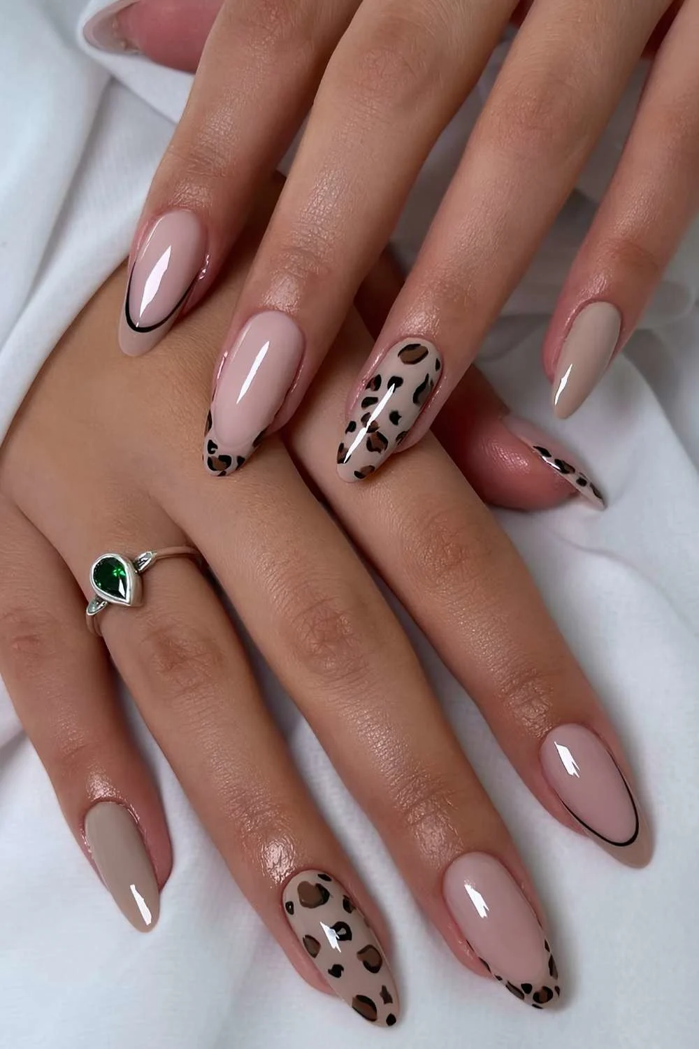 Taupe nails with leopard print art