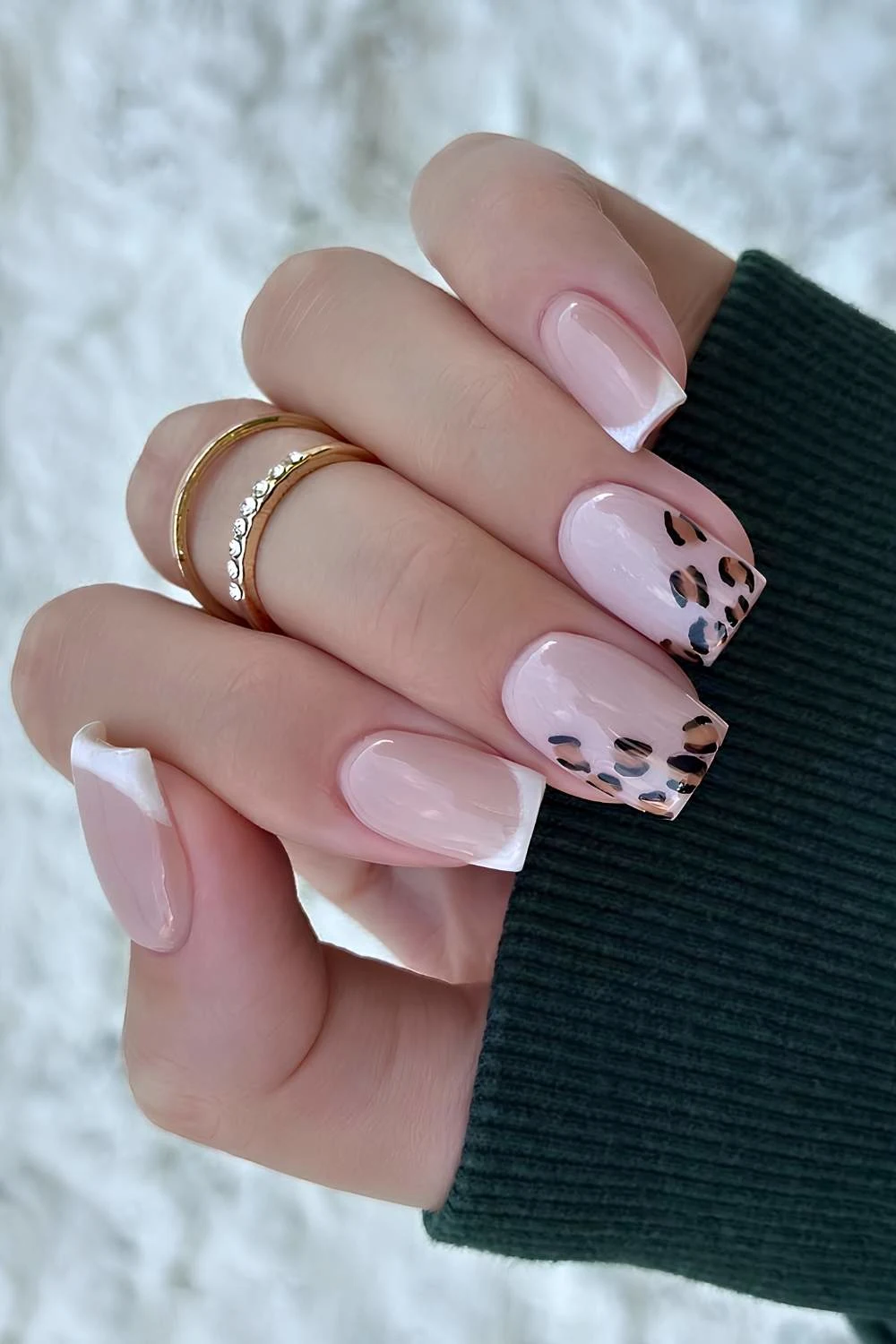 White French manicure with leopard spots