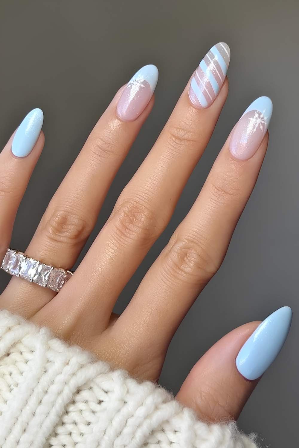Light blue Christmas nails with stripes