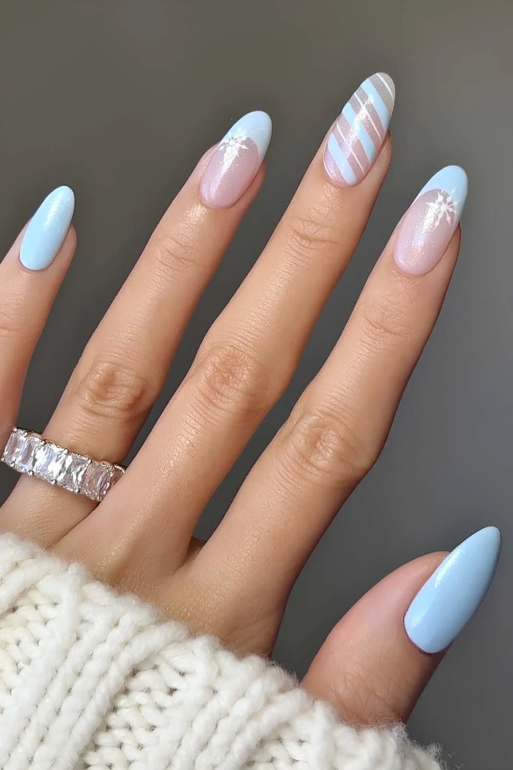 Light blue Christmas nails with stripes