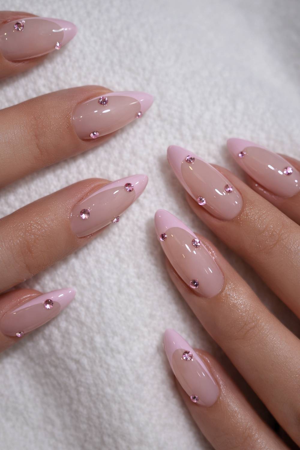 Light pink French nails with rhinestones