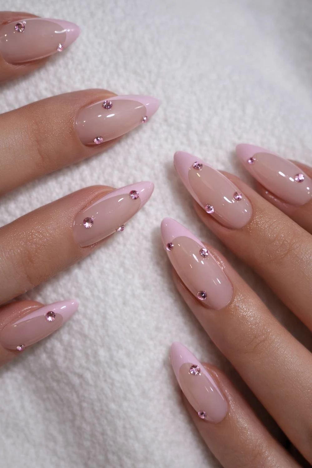 Light pink French nails with rhinestones