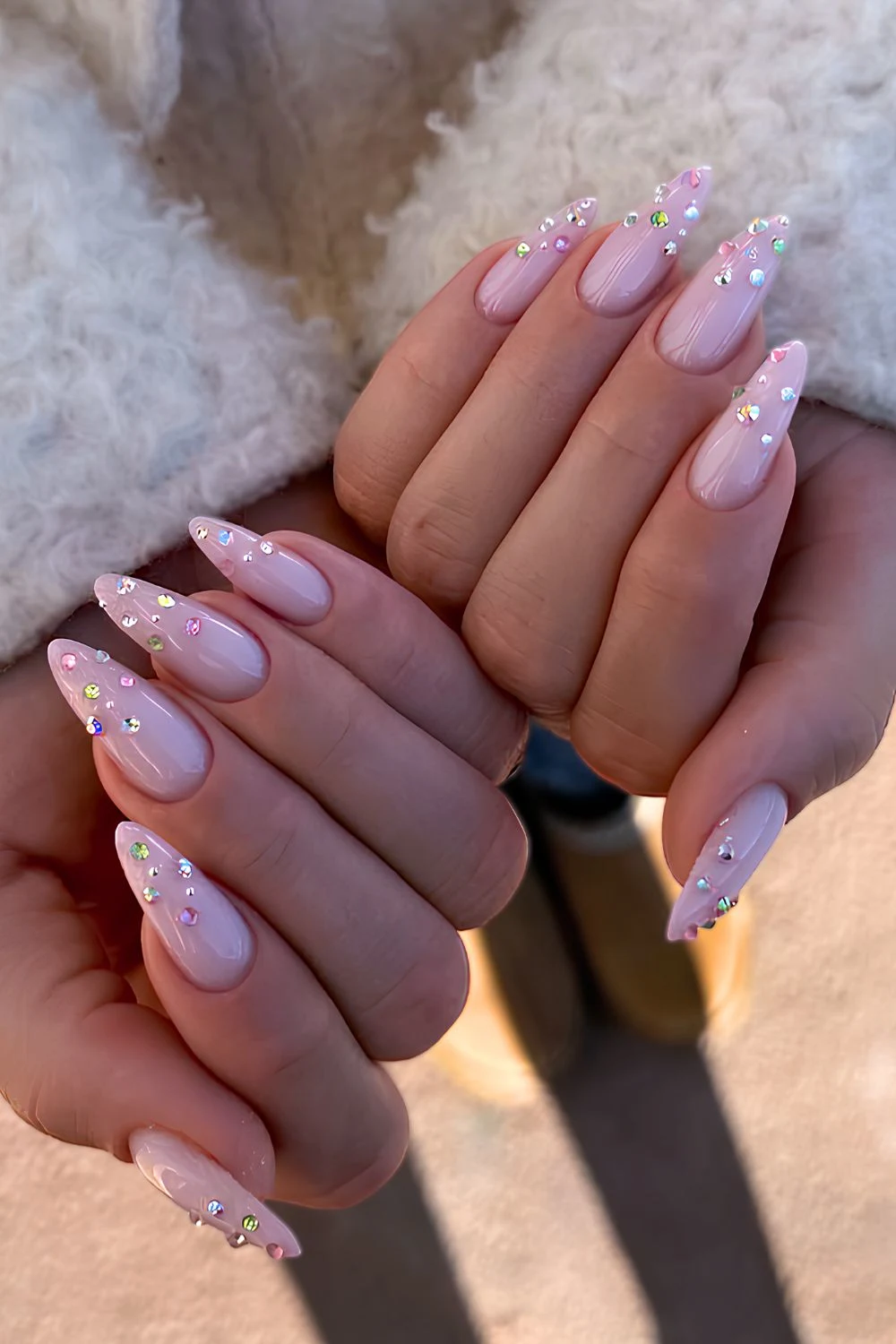 Milky pink manicure with rhinestones